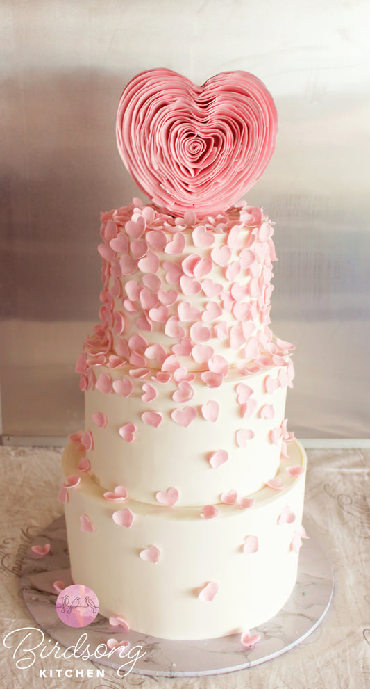 Romantic pink heart wedding cake