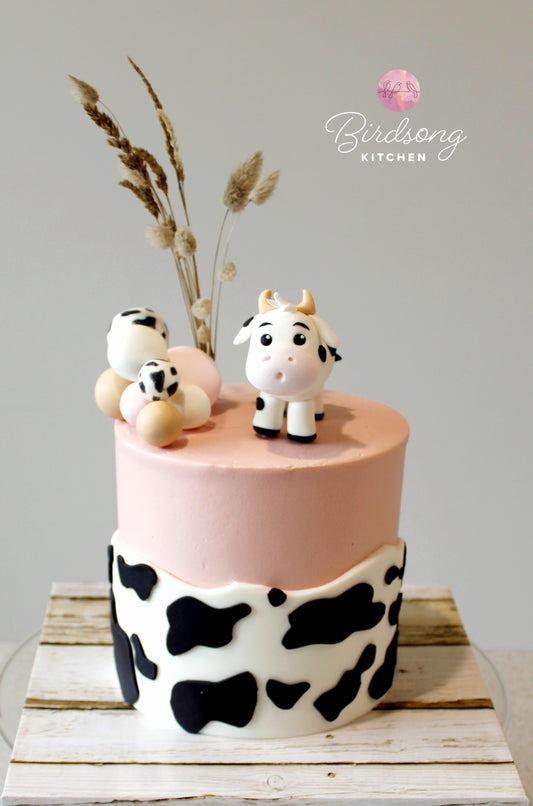 Daisy cow shower cake
