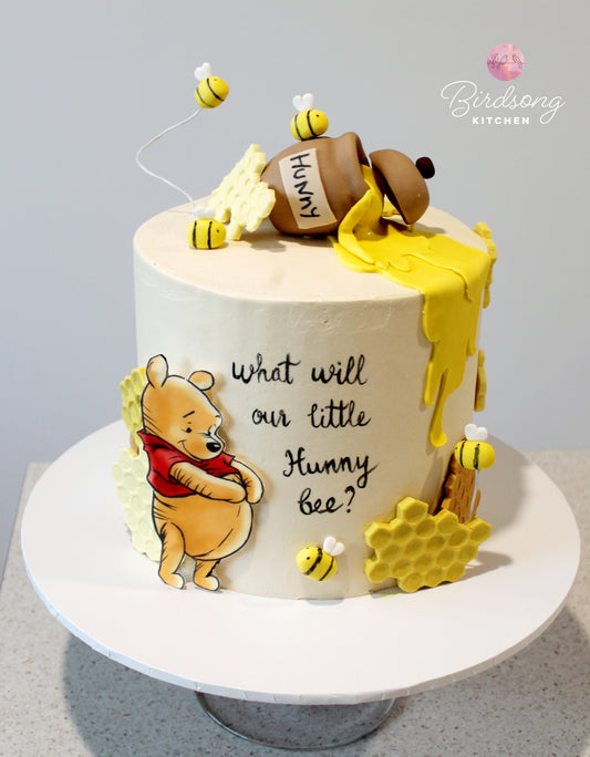 Winnie gender reviewal baby shower cake