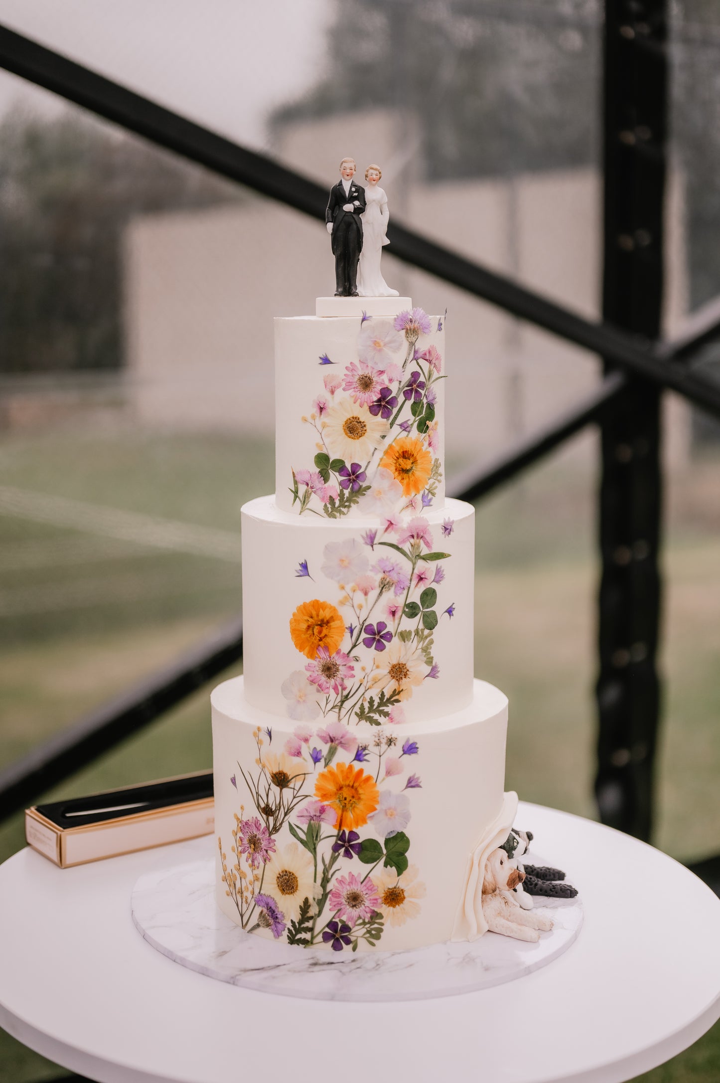 Pressed flowers wedding cake